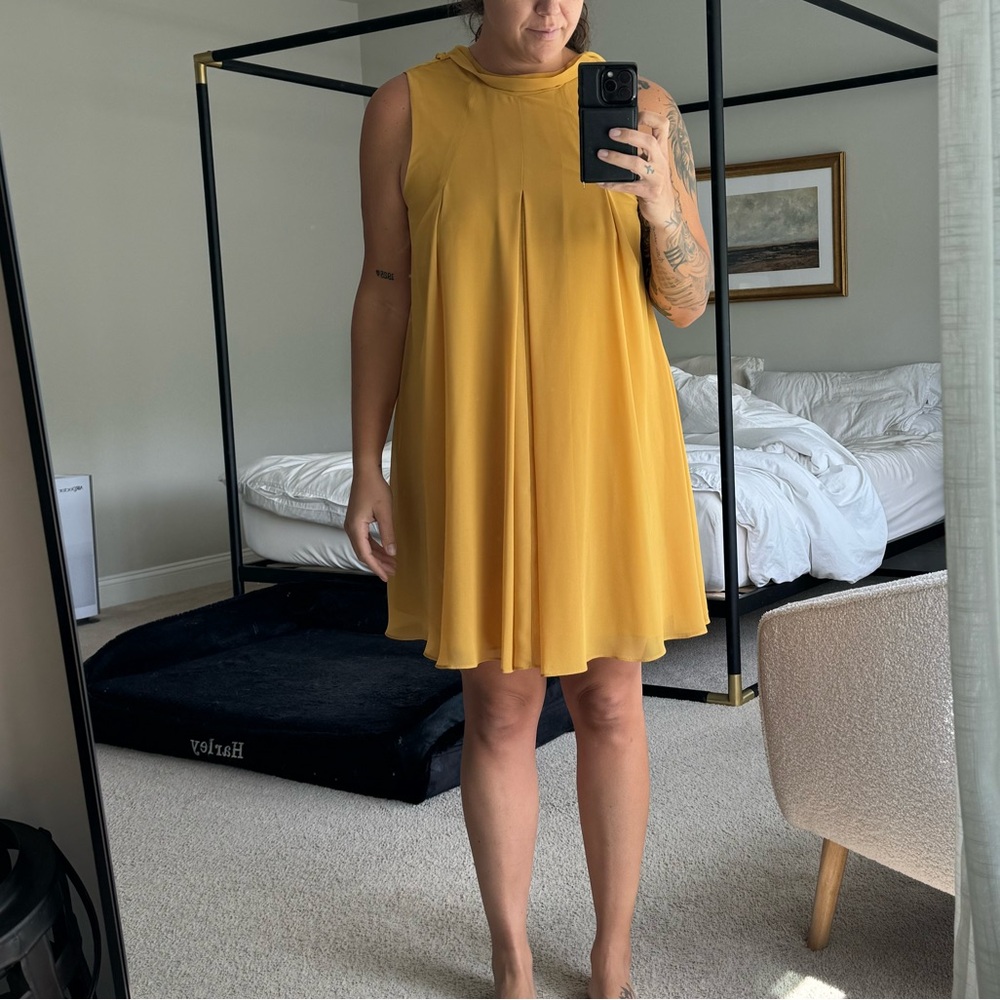 Gold dress. Ties in the back on the neck